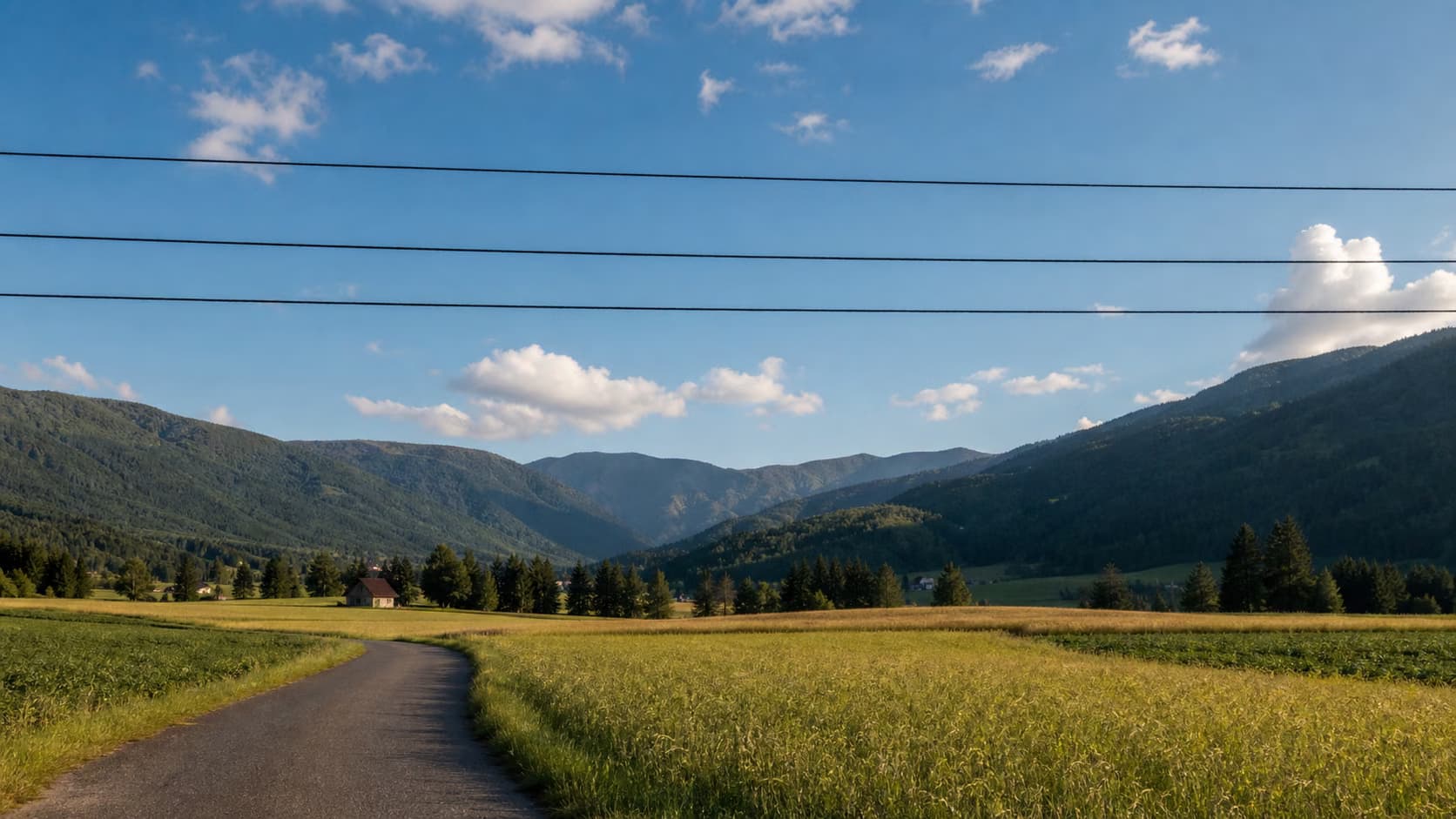 Clean Power Lines from a Landscape Sky before