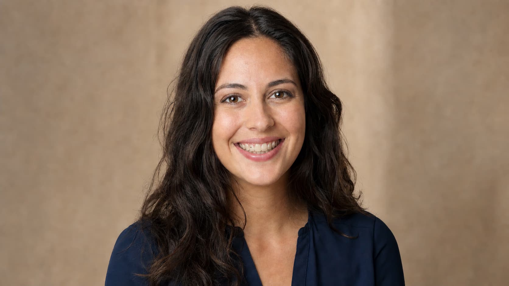 Portrait after visible dental braces are removed while the natural smile remains
